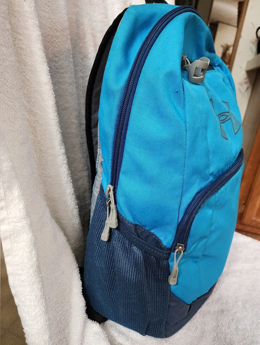 M.169- Under Armour Storm Backpack, blue teal, USED